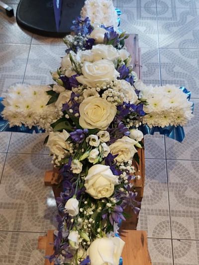 Maureens Florist - White & Purple Funeral Cross
